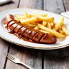 Duitse curryworst bakken